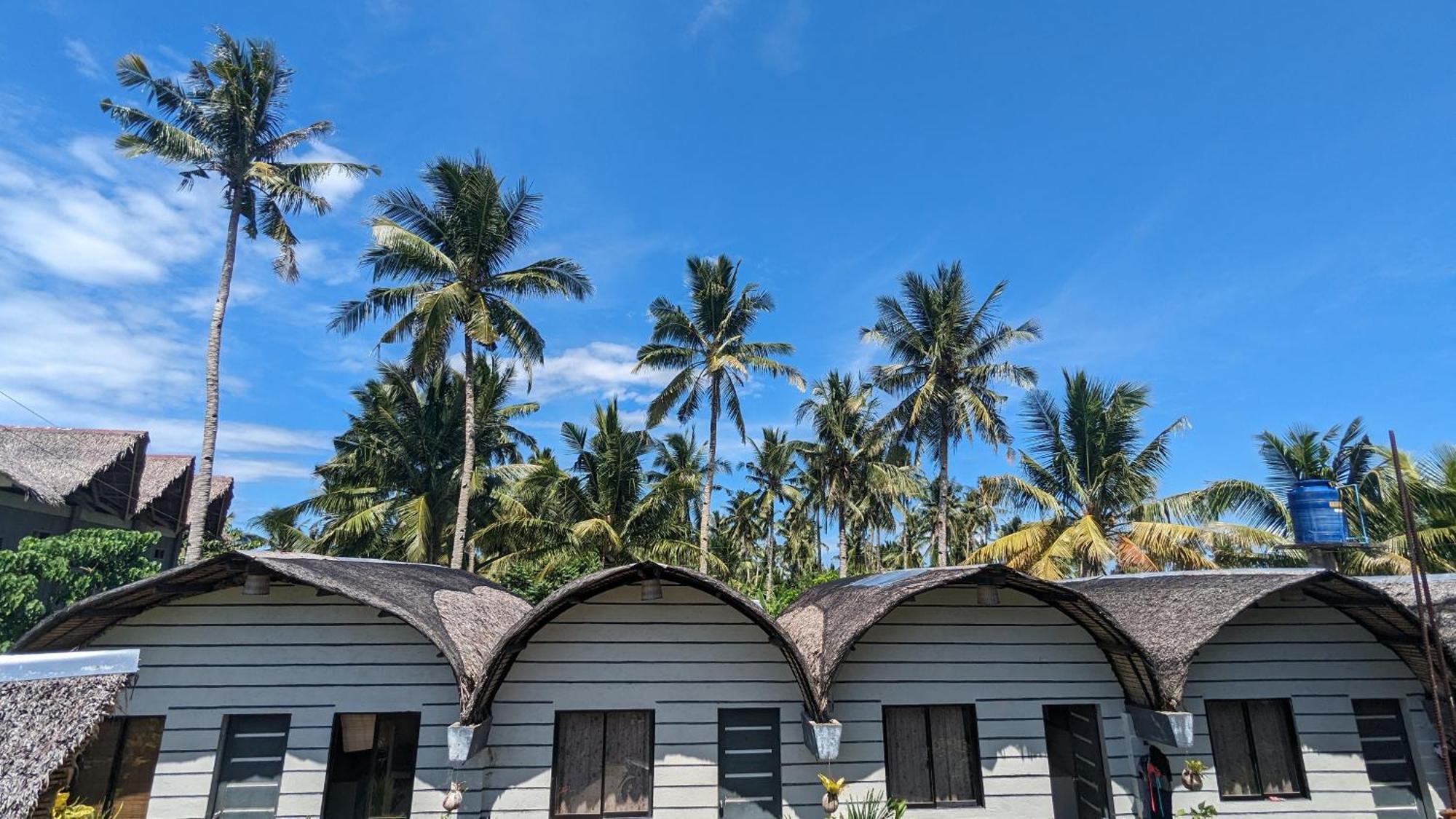 Апартаменты Point F Siargao Catangnan Экстерьер фото